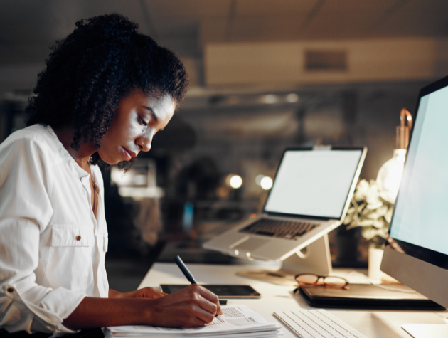 Professional corporate lawyer in a modern office, calmly reviewing urgent legal documents under time pressure, professional environment, business-focused, confident and composed expression
